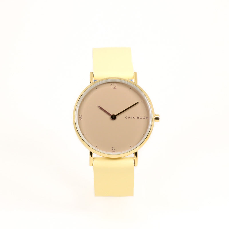 Montre jaune pâle / rosé 90's